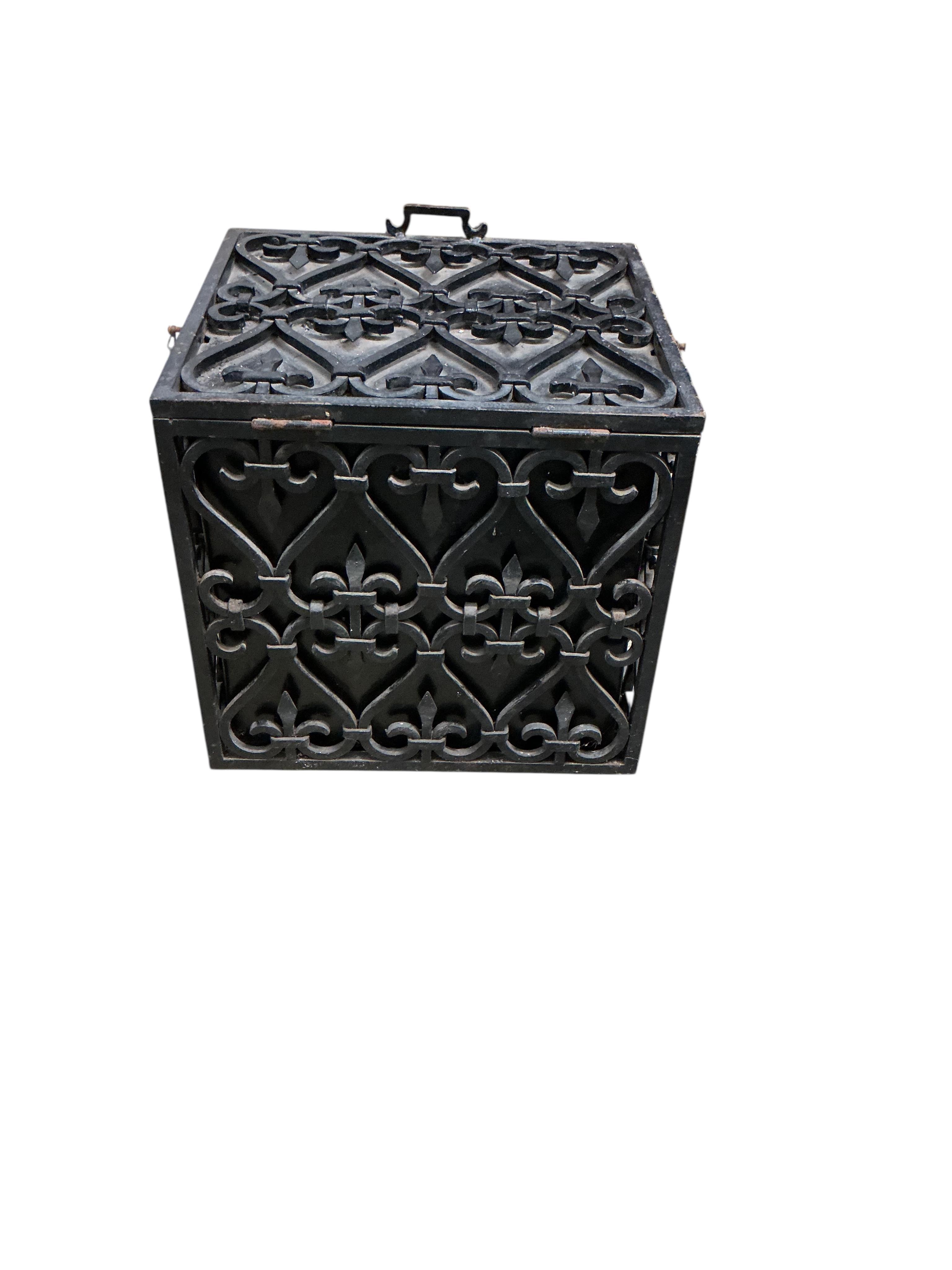 A wrought iron box with liner, width 37cm, depth 34cm, height 35cm